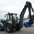 Brush-on-Backhoe_19fb4ef5-94c9-4f6d-a0fc-3573805ba901.webp